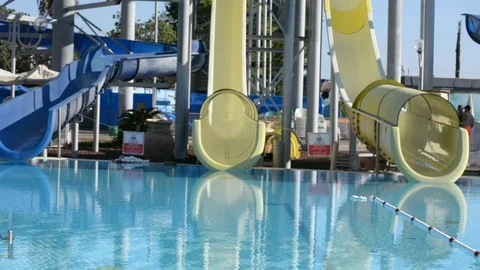 Empty swimming pool with slides. a Sunny day. 動画素材 95026086