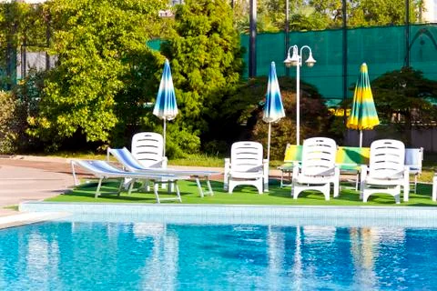 Empty swimming pool in summer day Stock Photos