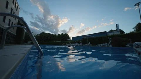 Empty Swimming Pool With The Sun Reflex, Close Up Stock Footage 254484760