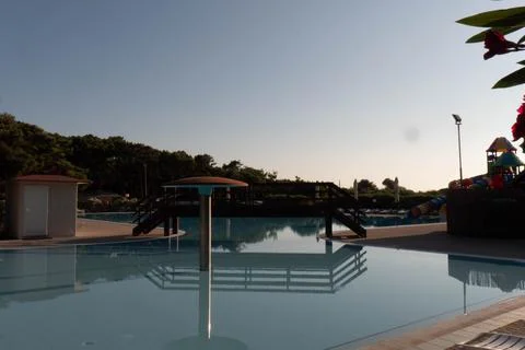 Empty swimming pool in the sunrising Stock Photos