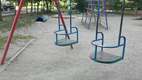 Empty swing 4K video footage background. Horror scene conceptual animation Stock Footage 272443863