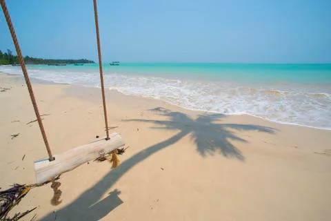 Empty swing on beach Fotos Stock