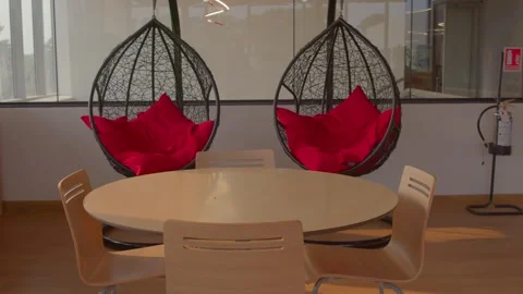 Empty swing chair in office Stock Footage 275505993
