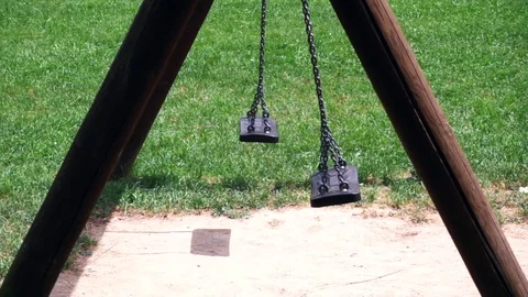 Empty swing at child playground Stock-Footage 110264256