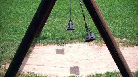 Empty swing at child playground Stock-Footage 110264270