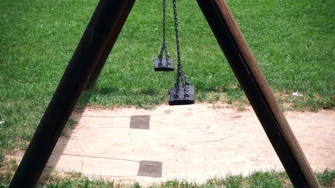 Empty swing at child playground Stock-Footage 110264477