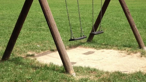 Empty swing at child playground Stock-Footage 110264496