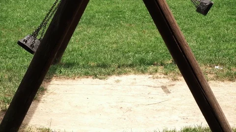 Empty swing at child playground Stock-Footage 110264654