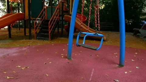Empty swing for children on chains Video stock 80999716