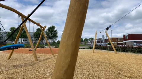 Empty swing on children playground Video stock 136028673