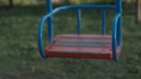 Empty swing for children slow motion Stock Footage 89552608
