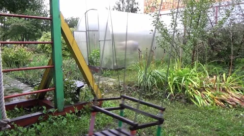 Empty Swing In A Children's Playground Stock Footage 58772341