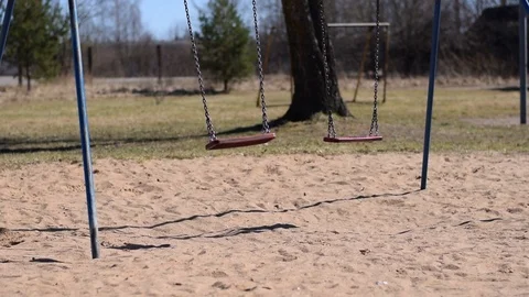 Empty swing in desolate area Stock Footage 88494155