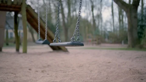 Empty swing during state of emergency by the reason of covid-19 Stock Footage 126780141