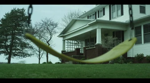 Empty swing in front of house 動画素材 47578166