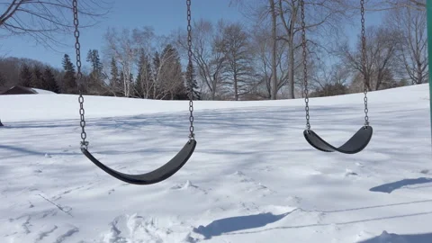Empty swing for kids. Winter, cold weather, outdoor Stock Footage 104603595
