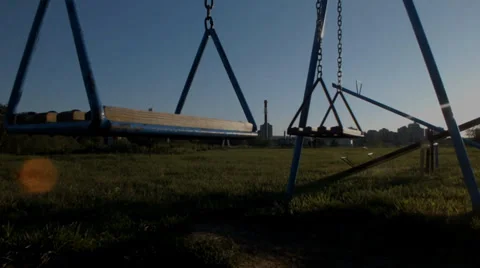 Empty swing in motion, momentum, in a small park above the town of Nis, Serbia Stockbeeldmateriaal 37847179