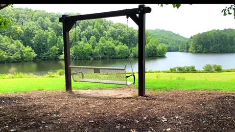 Empty Swing Overlooks Breathtaking Georgia Lake Stock Footage 138539356