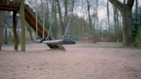 Empty swing in park during coronavirus lockdown Stock Footage 126779668