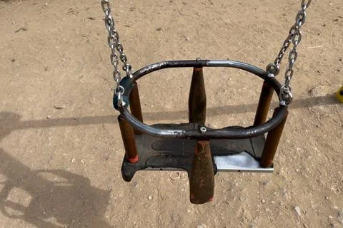 An empty swing in the park Fotos Stock