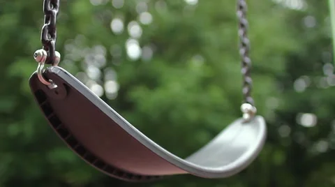 Empty swing at playground Stock Footage 67881964