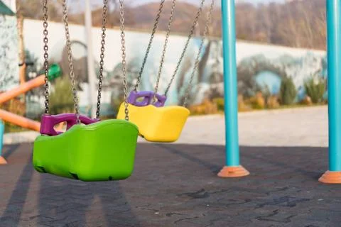 Empty swing at the playground Foto stock