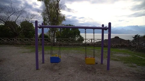 Empty swing playground in public park Stock Footage 102767064