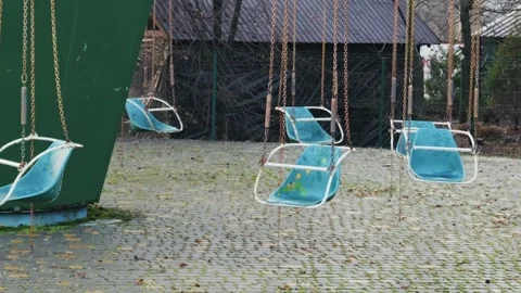 Empty Swing Ride at an Abandoned Amusement Park Stock Footage 326313810