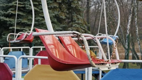 Empty Swing Ride at an Abandoned Amusement Park Stock Footage 329606036