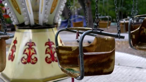 Empty Swing Ride Chairs Moving at Amusement Park Stock Footage 318354924