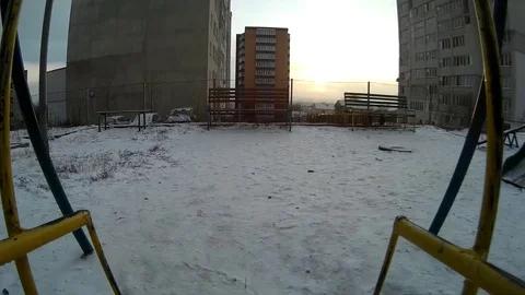 Empty swing set POV action camera fottage Ukraine, Khmelnytskyi Stock Footage 70158848