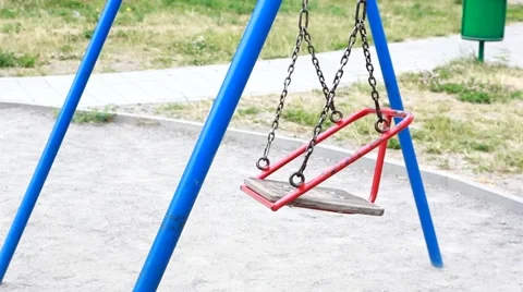Empty swing swaying Stock Footage 51780388