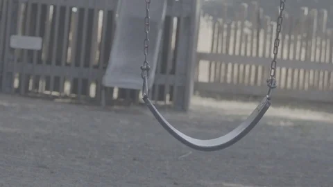 Empty Swing Swaying on Playground 스톡 동영상 85455795