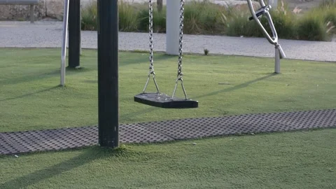 Empty swing swing in the playground Видео 151189730
