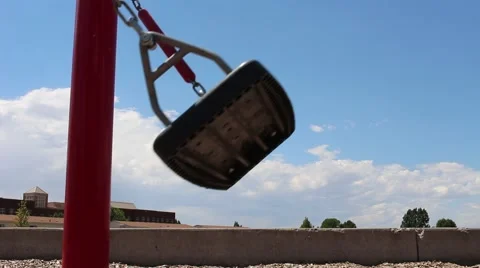 Empty swing swinging back and forth Stock-Footage 57328147
