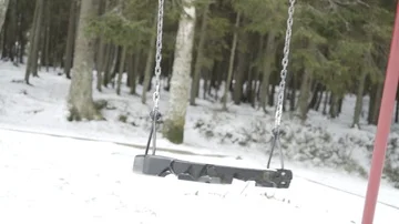 Empty swing in winter landscape Video stock 85538321