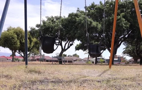 Empty Swings in an empty park Stock Footage 220929268