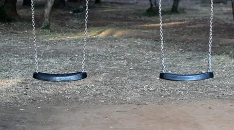 Empty swings Stock Footage 12224524