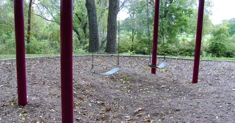 Empty Swings in Park - Fall - 4k Stock Footage 55689752