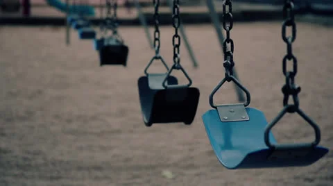 Empty swings on a playground Video stock 26671859
