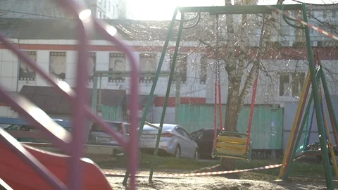 Empty swings on the Playground Stock Footage 128692332