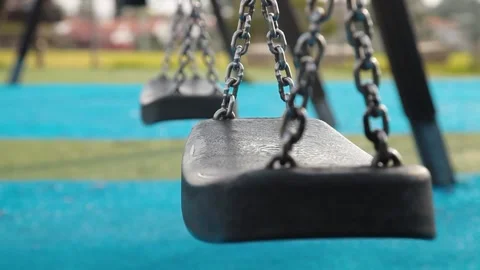 Empty swings in the playground Stock Footage 170754996