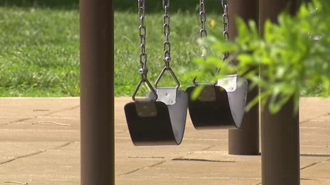 Empty Swings at Playground Stock Footage 256599194