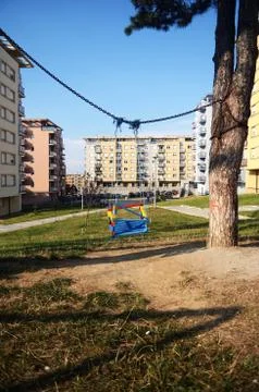 Empty swings in the playground Stock Photos