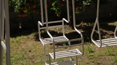 Empty swings swaying Video stock 40053050