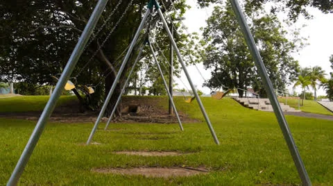 Empty swings swinging Stock Footage 25136114