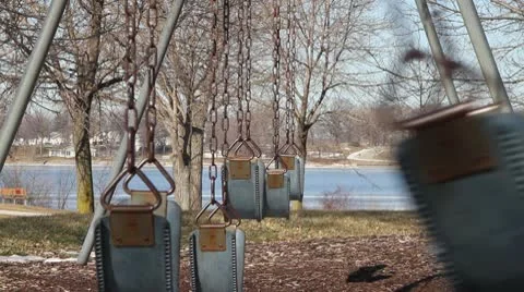 Empty Swingset With Swinging Swing Stock-Footage 10737743