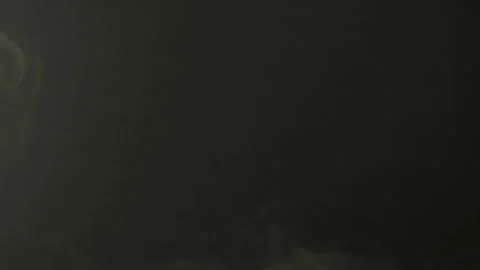 Empty syringes fall in slow motion smoke Stock Footage 156796084