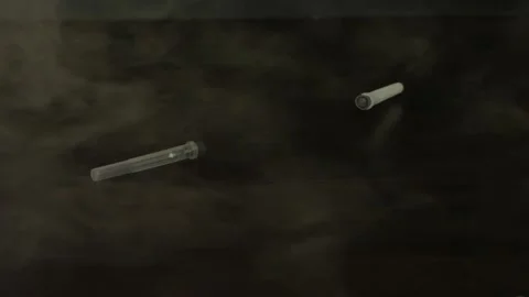 Empty syringes fall on the table in slow motion smoke 3 Stock Footage 156796095