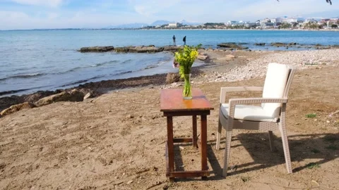Empty table and chair on the beach Stock Footage 203790530